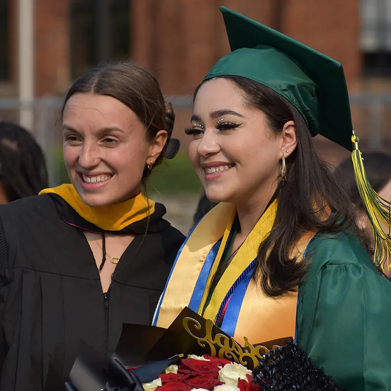 DCR teacher and student at graduation