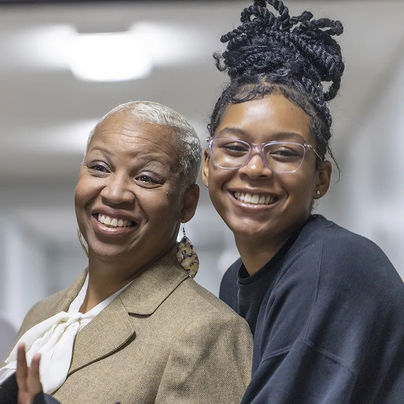 Detroit Cristo Rey student with academic advisor