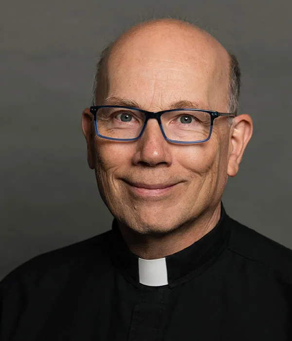 P. John Huber - Miembro del Consejo de Administración