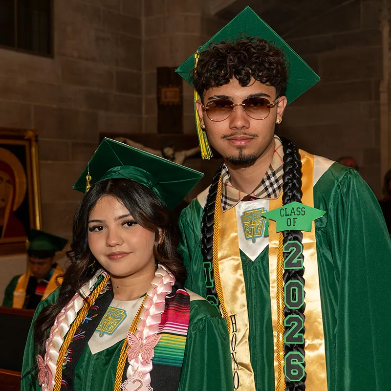 Smiling Detroit Cristo Rey Student at Graduation